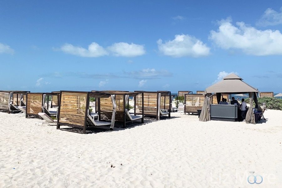 Atelier-Estudio-Playa-Mujeres-Family-Resort-beach-cabana-area-qbmzzteq5whbbdeo9q7fmg7jccuzeyjp24ga1oaqdc.jpg